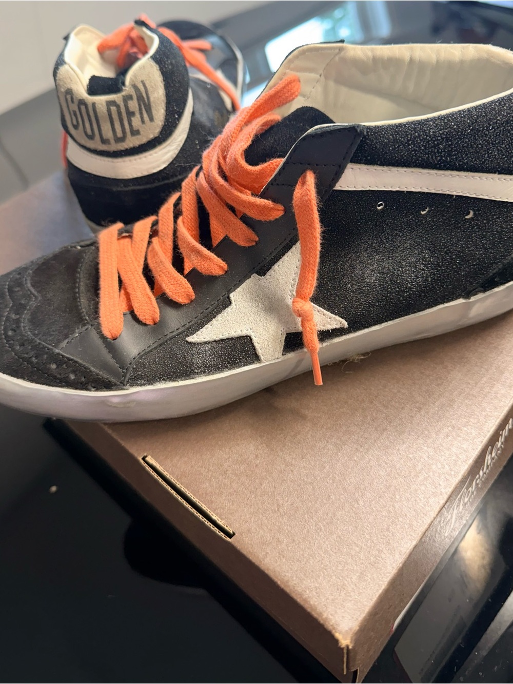 Golden Goose Black High-Top Sneakers with Orange Laces and White Star